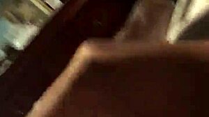 Black cock gets stroked casually.