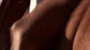 Black cock gets stroked casually.