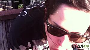 Latina Brunette Blows On Tall Bridge