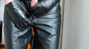 Guy Jerks Off Vigorously in Tight Leather Pants