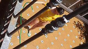 Voyeur Catches Hot Neighbor Peeing on Sexy Landlord's Wife from Balcony