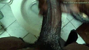 Black guy rubs his monster cock with soap in solo masturbation session