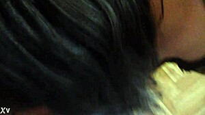 A transgender person in crossdressing attire engages in deep throat activity.