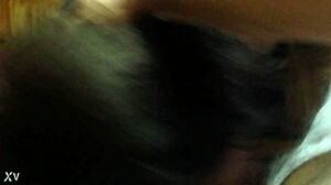 A transgender person in crossdressing attire engages in deep throat activity.