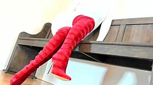 Domination in catsuit and boots.