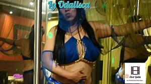 odalisque poses bent over in costume