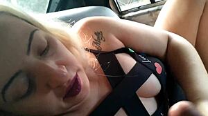 Blonde slut gives blowjob in public car