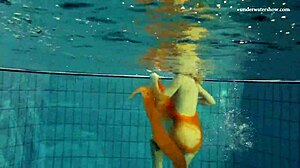 nastya strips bikini and shows tight pussy in pool