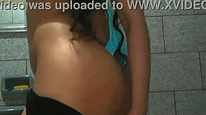 Asian girl fucks herself with monster dildo in bathroom