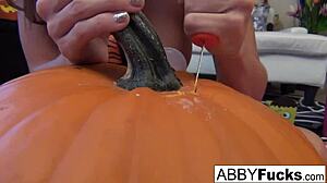 Abigail Mac carves a pumpkin before masturbating solo