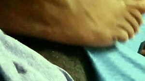 Wife gives intriguing footjob to husband in bedroom scene