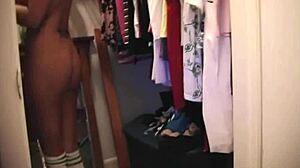 Kayden Krush applies makeup with her big boobs on display