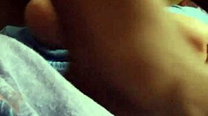 Wife gives intriguing footjob to husband in bedroom scene