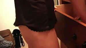 Kayden Krush applies makeup with her big boobs on display