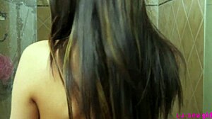 Cute brunette starts in the shower. She turns it into a sensual photoshoot on the sofa.