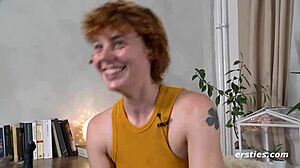 Redhead babe slams dildo deep inside