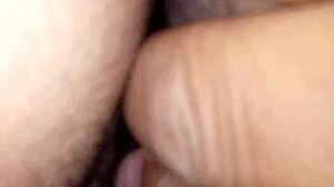 Hot woman masturbating on the bed.