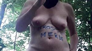 Female Slave Plays In Forest BDSM