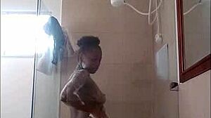ebony girl drops dildo in shower, oops
