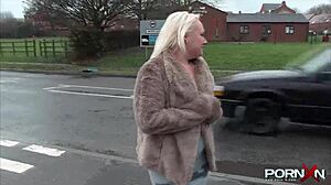 mature blonde flashes natural tits in public pissing scene
