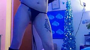 sexy amateur does striptease on webcam, ripping clothes while masturbating