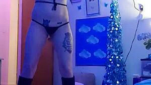 sexy amateur does striptease on webcam, ripping clothes while masturbating