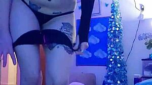 sexy amateur does striptease on webcam, ripping clothes while masturbating