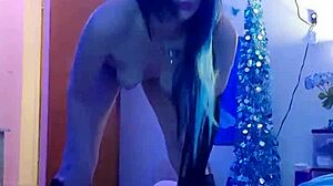 sexy amateur does striptease on webcam, ripping clothes while masturbating