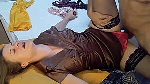 Amateur Slut in Satin Dress and Thong Teases with Dildo and Rimming in Doggy Style