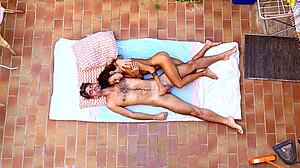 birdview of amateurs couple exposed on the balcony