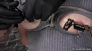 Babe in hogtie enjoys vibrator and dildo play