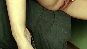 Sexy brunette fondles tight pussy