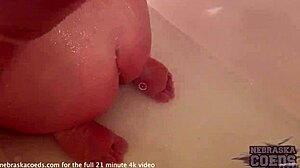Super cute amateur girl shaving her pussy in the bath
