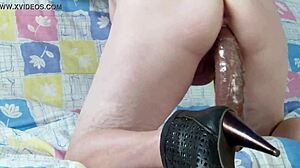 the dildo couldn't enter the wife on the sofa