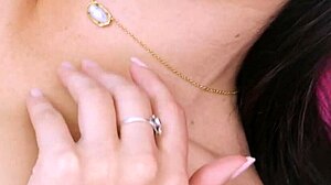 glamorous brunette shows off naked body