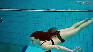 So, Czech girl Vesta just strips and dives naked into the pool.