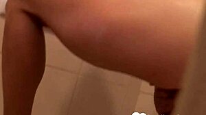 Blonde beauty pleasures herself in the shower