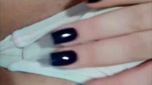 tattooed redhead shows off tan lines and big ass close-up