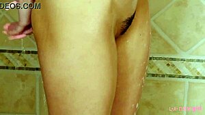 Brunette Beauty Captivates in a Sensual Shower Scene