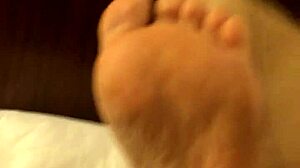 Coworker rubs high arches in fetish masturbation session