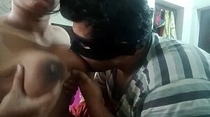 Hot Couple Kisses Passionately While Sucking Big Tits