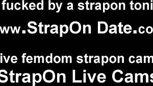 suck my huge black strapon cock now