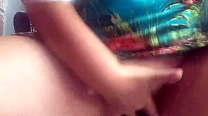 I'm fingering my shaved pussy in public.