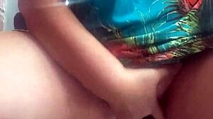 I'm fingering my shaved pussy in public.