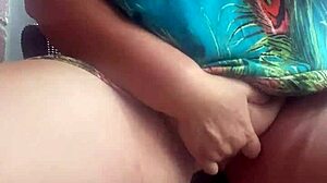 I'm fingering my shaved pussy in public.