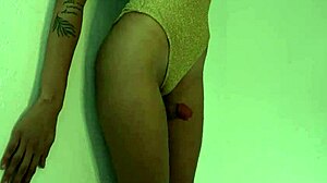 Old woman in gold leotard solo