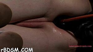 Tight pussy explored in BDSM session