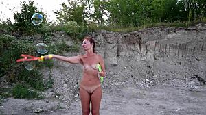 soap bubbles popping in outdoor naked amateur scene