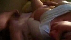 Intriguing babe fingers herself with big tits, gets facial.