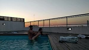 Cumming hard in pool at sunset